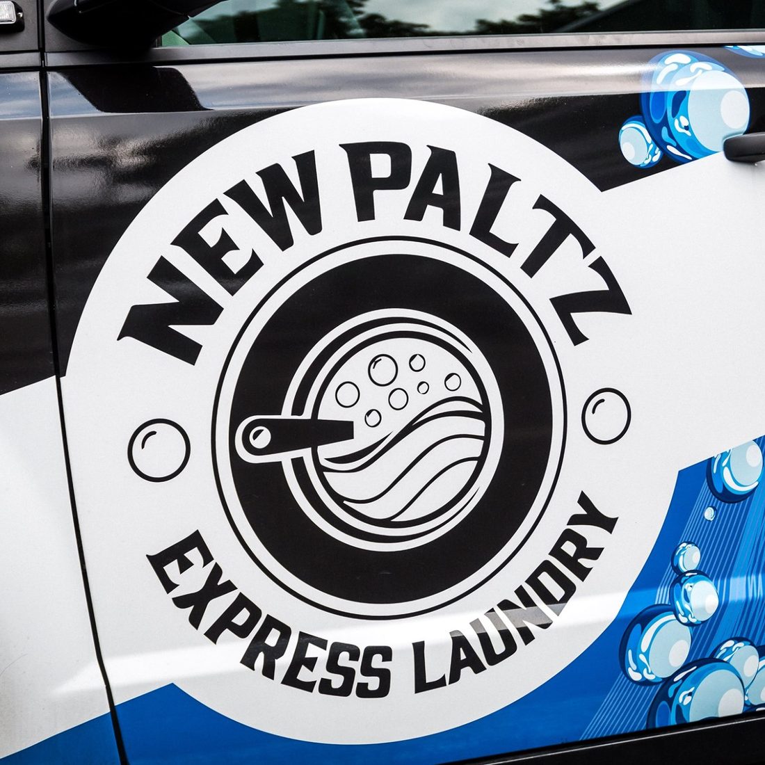 New Paltz Express Laundry van with bubbles graphic